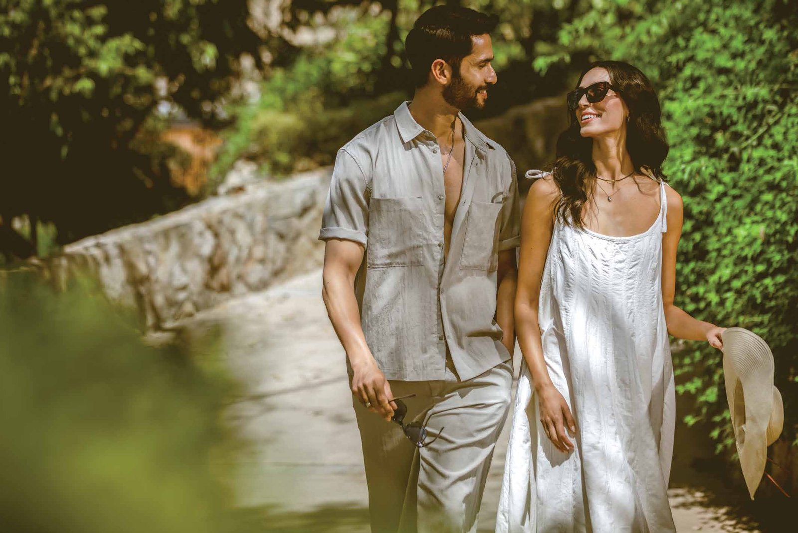 Residents walking a shaded garden path at Westin Residences Gurugram